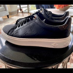 LOUIS VUITTON
Lambskin Embossed Monogram Time Out Sneakers